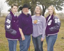 Travis Jonas, second from left, is pictured with, from left, son Eli, wife Rebekah, and daughter Erin. Courtesy photo
