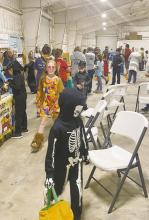 A number of area churches took part in Fall Fest 2022 Wednesday evening at the Jack County Fair Barn. Other vendors such as Jack County STOMP and Jacksboro Police also took part. Here, children take part in the Cookie Walk sponsored by Southwest Baptist Church. Photo/Brian Smith