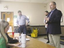 Perrin-Whitt CISD Superintendent Loren Sell, on right, speaks during the Wednesday, Oct. 30 meeting. The district’s finance and potential increases in the district’s tax rate were discussed. The next meeting is Thursday, Nov. 21. Photo/Brian Smith