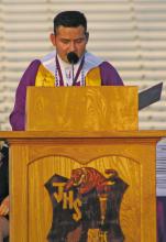 Jacksboro High School Valedictorian Uzziel Avalos addresses his classmates Friday, May 24 at Tiger Stadium. Avalos received a full ride scholarship to Duke University. Photo/Brian Smith