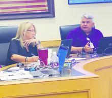 Jacksboro ISD Superintendent Brad Burnett explains the lowering in the tax rate while Board Secretary Lisa Perry listens in during the board’s Aug. 14 meeting. The board is looking at a proposed 25 cent reduction in the tax rate for the 2023-24 school year. A final vote on the budget and the tax rate is expected at a special Aug. 31 board meeting. Photo/Brian Smith