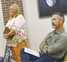 Jacksboro Economic Development Corporation Executive Director Brenda Tarpley speaks to Jacksboro aldermen at the Monday, May 13 meeting while Brent Hackley listens. Photo/Brian Smith