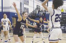 Emory Inman gets a hand in the City View player’s face. Inman and the Tigerettes suffered a loss Friday, Jan. 31. Photo/Brian Smith