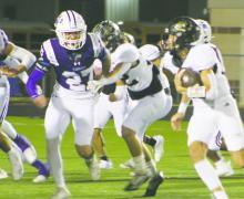 Hunter Moffitt (27) looks to make the hit on the Brady running back in Jacksboro’s 54-27 win Friday, Nov. 15 over Brady. Moffitt keyed a second-half defense where the Tigers posted a shutout. Photo/Brian Smith