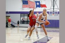 Hayden Walker drives to the basket for a layup attempt Tuesday, Nov. 11 against Memorial. Walker led the team in scoring with 14 points and five of those came from free throws. Photo/Ashley Anderson