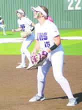 Brooke Reaves (foreground) and Kylie Tullous ready themselves defensively during the Tigerette’s series with Iowa Park. Photo/Brian Smith