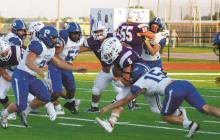 Luke Sams (6) looks for running room. Sams led the Tiger rushing attack with 54 yards as Jacksboro won its District 5-3A Division II opener over Eastland, 53-6. Photo/Brian Smith