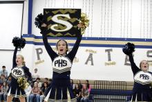 Members of the Perrin-Whitt Cheer team show off their skills at the Meet the Pirates event Thursday, Aug. 7. Head football coach Kevin Lloyd said the cheer leading team kicks off the event showing off some of their performances for the year. Photo/Ashley Anderson