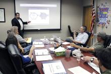 Municipal Market Advisor John Blackburn reviews the Chapter 313 agreement and options for a bond election with Bryson ISD school board trustees as Hecate Energy Longhorn Solar LLC was set to enter its 10-year limitation period. Photo/Ashley Anderson