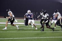 Hoytt Wesson runs after an offensive player at linebacker. Wesson played significant time at quarterback during this contest. JHG file photo