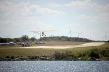 Planes fly into the Jacksboro Municipal Airport at a previous fly-in event where pilots compete in competitions with their aircraft. The community is welcome to come out to the airport to set up a lawn chair and watch the competitions, beginning at 1 p.m. Saturday, Sept. 27. Photo/City of Jacksboro