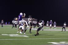 Issak Wesson catches a pass Friday, Aug. 29, against the Knights. Wesson led the team in receiving on the night with 116 yards and a touchdown. Photo/Ashley Anderson