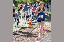 Joslyn Whitfill runs around the course at the state cross country meet Friday, Oct. 31. Whitfill has a strong performance finishing in 52 out of 145 runners. Contributed photo