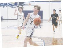 Perrin’s Case Lambert drives to the basket as part of an 11-point first quarter in the Pirates’ 86-28 win Tuesday, Dec. 19. Photo/Brian Smith