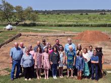 Members of Post Oak Baptist Church gather at the building site for the church's new fellowship hall. Photo/Randy Lewis