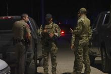 Law enforcement officers from multiple agencies at a command post following a shooting Saturday, Oct. 12 in Bryson. (Photo/Kylie Bailey)