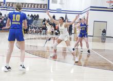 Perrin’s Baylee Meadows (23) plays defense with Bryson’s Abby Zielinski (24) trying to get open in Perrin’s 45-23 win over the visiting Cowgirls. Perrin plays at Newcastle Friday, Jan. 24 with Bryson playing at Garner. Photo/Brian Smith