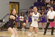 Holly Lehman returns a serve with Rylee Bennett backing up during the Tigerettes’ loss Tuesday, Oct. 15 to Vernon. Photo/Brian Smith