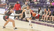 Starr Wesson (13) looks to head toward the baseline in the Tigerettes’ game with Eastland. Jacksboro suffered a 47-41 home court loss to the Lady Mavs. Photo/Brian Smith