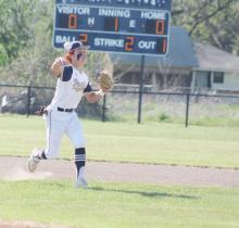 Noah Morris throws the ball to first after fielding a grounder. Morris had a three-RBI triple in helping the Pirates win 15-0. Photo/Brian Smith