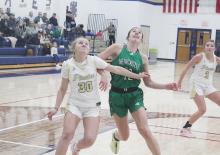 Kadie Dugan (30) blocks out Newcastle’s Mattie Dollar during first half action on Tuesday, Jan. 7. Perrin saw its district mark fall to 1-1 with a 55-33 loss. Photo/Brian Smith
