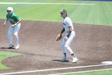 Cannon Valenzuela holds the Wall runner at first base. The Tigers suffered a 6-1 loss in game one of the regional final series and will play against Saturday, May 24 in Brownwood. Photo/Brian Smith