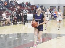 Brailyn Tullous heads to the basket during the Tigerettes’ 52-22 win over Poolville. Tullous led Jacksboro with 19 points. Photo/Brian Smith
