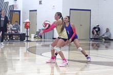 McKieran Murphy (3) returns a serve with Lauren Morris providing backup Tuesday, Oct. 29 during Perrin’s loss to Garner. Photo/Brian Smith
