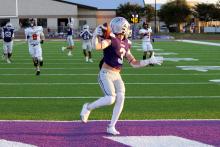 Kris Wicks runs into the endzone with the ball in one of the Tigers earlier matchups. Wicks had a big day in the receiving game Friday, Nov. 7, against the Holliday Eagles with three touchdowns and 142 yards on seven catches. Photo/Ashley Anderson
