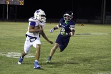Noah Morris chases down a defender during one of the Pirates’ matchups. The Pirates currently hold a 6-2 record on the season. Photo/Ashley Anderson
