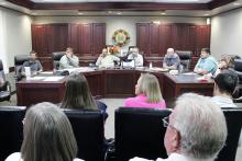 Perrin-Whitt School Board members call for a bond election in November. From left are board members Michael Francis, Michael Adams, President Chris Keeney, Superintendent Loren Sell, Vice President Mark Sims, Chad Lambert and Delaina Henderson. Attending remotely through video conference is James Hall. Photo/Ashley Anderson