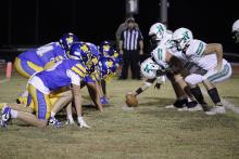 Cowboys defense lines up to stop the Bobcats in their matchup Friday, Nov. 7. The Cowboys will have many young and veteran playmakers returning to the team next season. Photo/Ashley Anderson