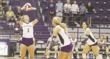Senior setter Brailyn Tullous sets the ball for Hayden Walker or Lily Webster to put the ball over the net during the Friday, Sept. 6 match with Poolville. Photo/Brian Smith