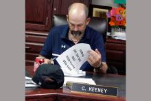 Perrin-Whitt CISD School Board President Chris Keeney reviews the district’s 2025-2026 proposed budget and tax rate before their adoption Thursday, Aug. 28. Photo/Ashley Anderson