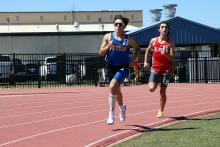 Ty McComack runs Saturday, March 21 at the Possum Kingdom Relays in Graham. McComack placed first in the 400-meter dash and 800-meter dash Monday, March 23 at Bryson Relays. Photo/Ashley Anderson