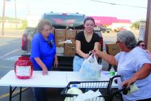 Jacksboro Lions Club members Donna Cassle and Madison Collins collect donations for Pack the Pickup in 2024 in front of Lowe’s Market. The annual donation event, taking place from 3-6 p.m. Wednesday, Oct. 29 through Friday, Oct. 31, will directly benefit the Jacksboro Community Food Bank’s monthly distributions. Archive photo
