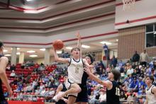 Case Lambert drives to the basket Friday, March 6. The Pirates put up a fight but lost in the regional final to the Huckabay Indians 61-33. Photo/Alex Havardansky