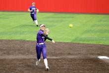 Holly Lehman throws over to first base Saturday, March 7. Lehman used her speed on the basepaths to score multiple runs in Jacksboro’s weekend tournament. Photo/Alex Havardansky
