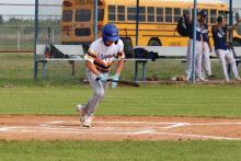 Bryce Thorne makes contact at the plate in a previous matchup against Perrin-Whitt. The Bryson Cowboys head into the playoffs after defeating Saint Jo then falling to Perrin-Whitt last week. Photo/Ashley Anderson