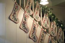 Stockings for children and grandchildren line the stairway in the Haston family home. The home was a featured stop on the Jacksboro Chamber of Commerce Tour of Homes. Photo/Ashley Anderson