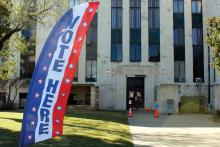 A flag outside the Jack County Courthouse marks polling locations in November. Candidates have until Monday, Dec. 8 to file for the upcoming March primary election. Photo/Ashley Anderson