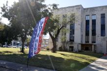 A flag outside the Jack County Courthouse marks polling locations in the November election. Candidates have until Monday, Dec. 8 to file for the upcoming March primary election. Photo/Ashley Anderson