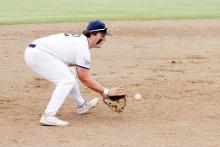 Third baseman and senior Joe Welch scoops up the ball on an infield hit Tuesday, April 14 against the Saint Jo Panthers. The Pirates defeated the opposition 11-1. Photo/Ashley Anderson