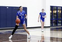 Jaydah McComack, 3, and Joslyn Whitfill, 10, run up the court in one of the Cowgirls’ previous matchups. The Cowgirls fought all game long to come away with a 36-18 victory Thursday, Jan. 22 over the Throckmorton Lady Greyhounds. Photo/Ashley Anderson