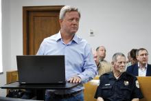 Capex Consulting Group Tax Consultant Jeff Snowden reviews abatement agreements for solar and battery energy storage projects during a public hearing Monday, April 27, detailing the scope of the project and negotiated covenants within the abatement agreements. Photo/Ashley Anderson