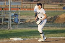 Ava Avarzamani stands ready to defend third base Monday, March. 2. The Lady Pirates put up a fight against the Nocona Lady Indians but lost 17-2. Photo/Ashley Anderson