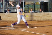 Brooke Reaves makes contact with the ball Tuesday, March. 3. Reaves hit a double into left to help score the game's opening run against the Holliday Lady Eagles. Photo/Ashley Anderson