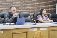 Jacksboro City Council members Greg Robinson and Libby Gonzales listen to discussions at a meeting on Monday, Feb. 9. The council signed a Chapter 380 agreement with the city and Crombie Properties to grant a 50% property tax abatement for the development of housing. Photo/Ashley Anderson