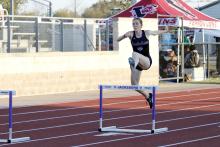 Kylie Johnson clears the first set of hurdles Thursday, March 19 at the Jacksboro High School Invitational track meet. Johnson placed second in JV girls 300-meter hurdles. Photo/Ashley Anderson