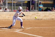 Bella Nail singles on a bunt to first base. Bats were hot Saturday, March 21 in the Jacksboro Tigerettes’ 9-1 win over the Bowie Lady Rabbits. Photo/Ashley Anderson